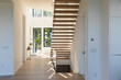 © Raymond Forbes LLC/Stocksy - Elegant Modern Stairway in Home by the Ocean