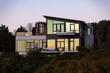 © Raymond Forbes LLC/Stocksy - Modern home at Waterfront  with lots of glass