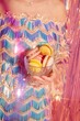 © Liliya Rodnikova/Stocksy - Unrecognizable woman hold cup of macaroons
