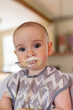 © Cara Dolan/Stocksy - Cute Messy Baby Eating Yogurt in his High Chair