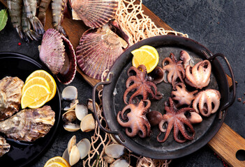 Poster - Fresh seafood arrangement on dark background.