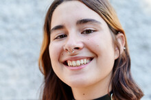Carefree Young Person With Piercings Smiling