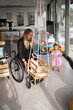 © Santi Nuñez/Stocksy - Mother In Wheelchair Playing With Her Daughter