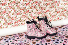 Boots On A Floral Background