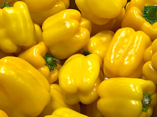 Background from fresh yellow peppers. 