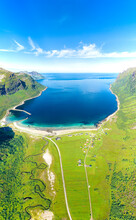 Aerial View Of Road In Green Meadows Leading To The Scenic Ersfjord Beach Washed By The Crystal Sea, Senja, Troms, Norway, Scandinavia