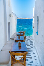 View Of Sea And Restaurant Tables In Mykonos Town, Mykonos, Cyclades Islands, Greek Islands, Aegean Sea