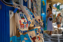 Souvenir Bags For Sale In Narrow Street In Mykonos Town, Mykonos, Cyclades Islands, Greek Islands, Aegean Sea