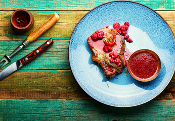 Wall Mural - Pork steak with berry sauce, bbq