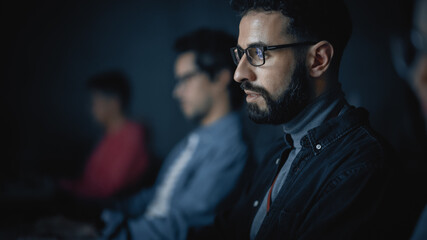 Fototapete - Handsome Smart Male Student, Studying in University with Diverse Multiethnic Classmates. He Works on Desktop Computer in College. Applying His Knowledge in Writing Code, Developing Software.