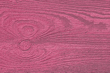 Pink Texture Of Pine Wood Grain With Knot. Vintage Pacific Pink Abstract Background With Wood Panel Pattern For Print Or Design.
