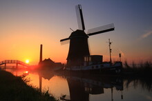 Dutch Windmill At Sunset