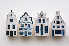 Traditional Porcelain Figurines Of Dutch Houses, Tourist Souvenirs In The Netherlands.