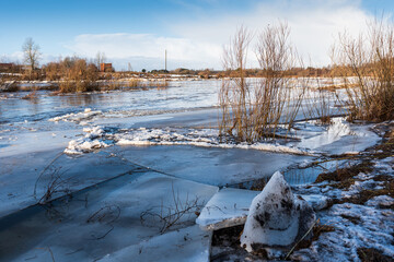 Canvas Print - Close up view of ice drift on the frozen river. Melting ice. Stack of ice. Concept of spring floods