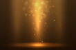 Shiny gold dust effect. Golden abstract bokeh on a dark brown background. Holiday concept.