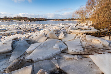 Canvas Print - Close up view of ice drift on the frozen river. Melting ice. Stack of ice. Concept of spring floods