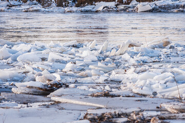 Canvas Print - Close up view of ice drift on the frozen river. Melting ice. Stack of ice. Concept of spring floods