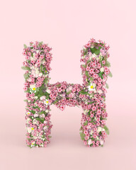 Creative letter H concept made of fresh Spring wedding flowers. Flower font concept on pastel pink background..