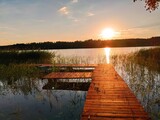 Fototapeta Fototapety pomosty - Zachód słońca nad jeziorem na Mazurach