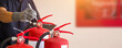 © Jintana - Engineer inspection checking pressure gauge level fire extinguisher of protection and prevent and safety rescue and use of equipment on fire training.