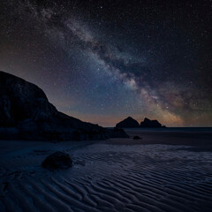 Canvas Print - Digital composite image of Milky Way night sky over beautiful landscape images of Holywell Bay beach in Cornwall UK