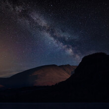 Digital Composite Image Of Milky Way Night Sky Over Landscape View Across Derwentwater From Manesty Park Towards Blencathra And Walla Crag