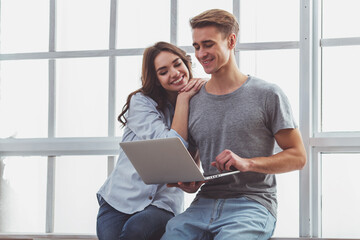 Wall Mural - Beautiful couple at home