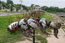 Iron Performance. Art Object Iron Fish In Steampan Style. Installed On The Embankment Of The Seraya River