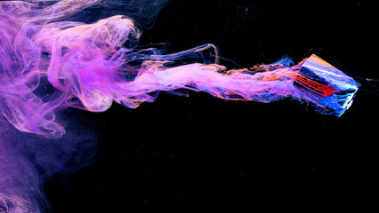 Wall Mural - Ink in water isolated on Black background.