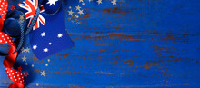 Happy Australia Day, January 26, Theme Dark Blue Vintage Distressed Wood Background With Australian Flag And Decorations With Copy Space For Your Text Here. Social Media Or Web Cover Image Banner.