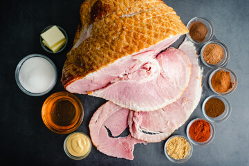 Wall Mural - Ingredients for a Glazed Spiral Cut Ham: A smoked ham with honey, sugar, and spices to make a glaze