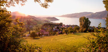 Golden Sunset Scenery Over Tourist Resort Krattigen, View To Lake Thunersee, Switzerland