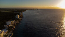Aerial Drone View Of Sunset Over The Caribbean Sea Along The Coast Of Tropical Island Cozumel, Mexico. 
