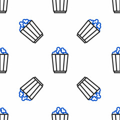 Poster - Line Popcorn in cardboard box icon isolated seamless pattern on white background. Popcorn bucket box. Colorful outline concept. Vector