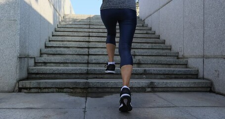 Poster - Fitness sports woman running up stairs in city