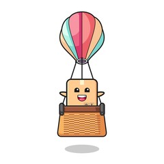 Sticker - cardboard box mascot riding a hot air balloon