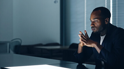 Poster - Businessman watching a blight screen in the dark office. Stereoscopic vision. Heads up display.