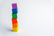 Six colored wooden blocks vertical on white background. Index or infographic 6 with copy space. Toy Blocks, Wooden Cube Bricks