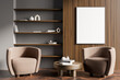 © ImageFlow - Dark living room interior with empty white poster, armchairs, shelves