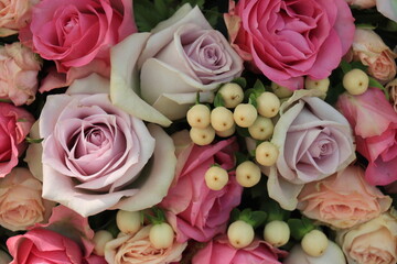 Wall Mural - Pink and purple roses in a wedding centerpiece