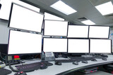Fototapeta  - group of blank monitors and screen on security desk or control room for monitor process or stock data trading