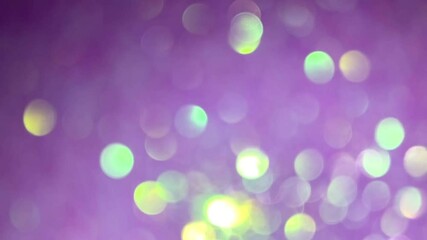 Christmas purple bokeh background lights sparkle Christmas background with abstract purple green light and glitter holiday. lights, footage.