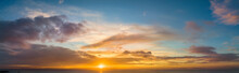 Panorama Of A Beautiful Sunset Sky Over The Sea With Blue And Orange Color Tones