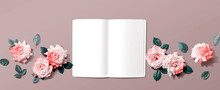 White Blank Notebook With Pink Roses Overhead View - Flat Lay
