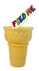Wall Mural - Basic, simple empty ice cream cone with FEED ME message. Isolated.
