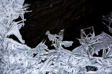 Wall Mural - Ice flower and frost pattern on the stream cold winter.