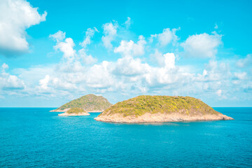 Panoramic coastal Con Dao view from above, with waves, coastline ,clear sky and road, blue sea and mountain.