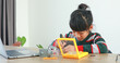© Narin Sapaisarn - The little girl asian building robotic car in science lesson in the house . Which increases the development and enhances learning skills gifted brilliant children working with technology.