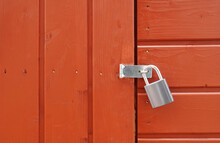 Padlock On Locked Door Of Wood Cabin Or Wooden Shed
