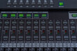 © pro2audio - Control buttons and LED indicators on the mixing console. Selective focus